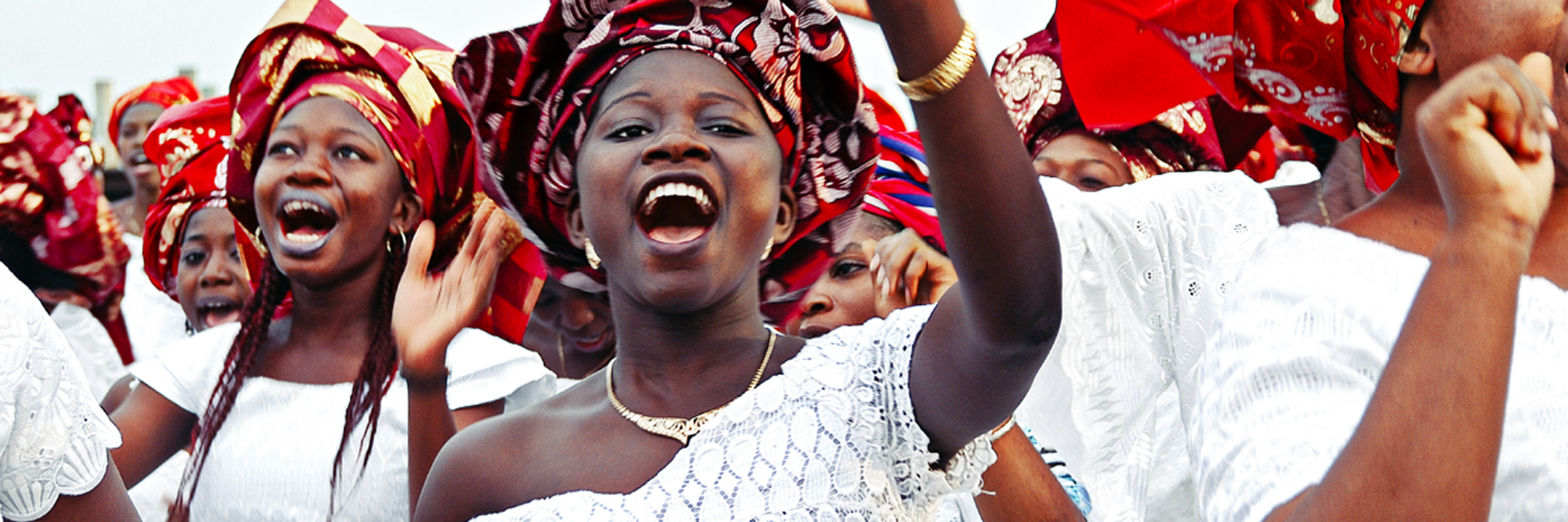 African women celebrating in traditional clothing