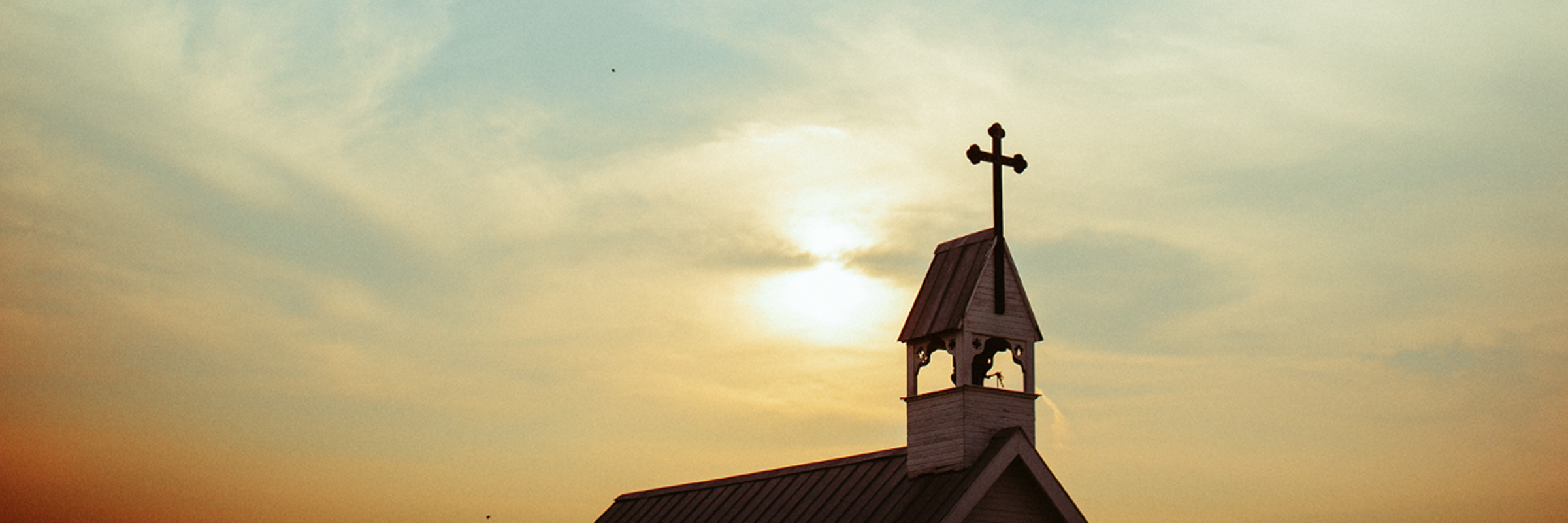 Church steeple at sunset